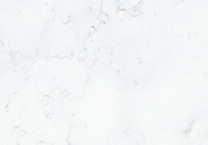 a close up of a white marble surface
