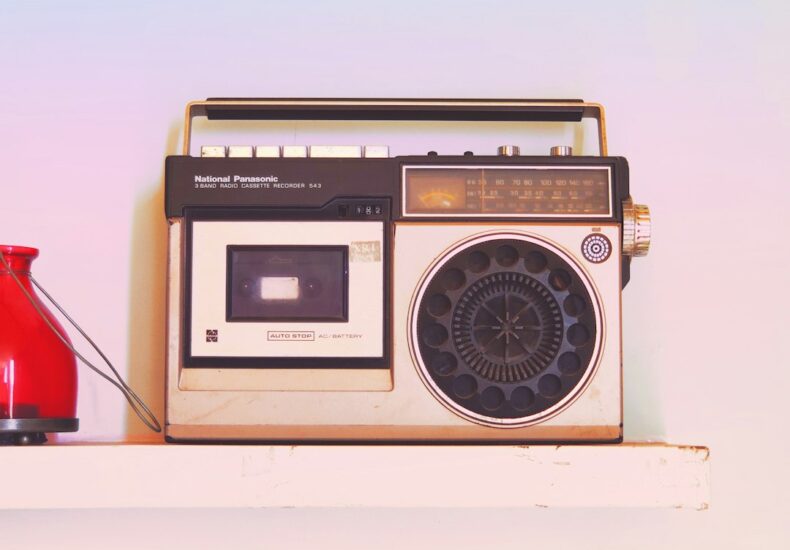 brown and black radio on white table