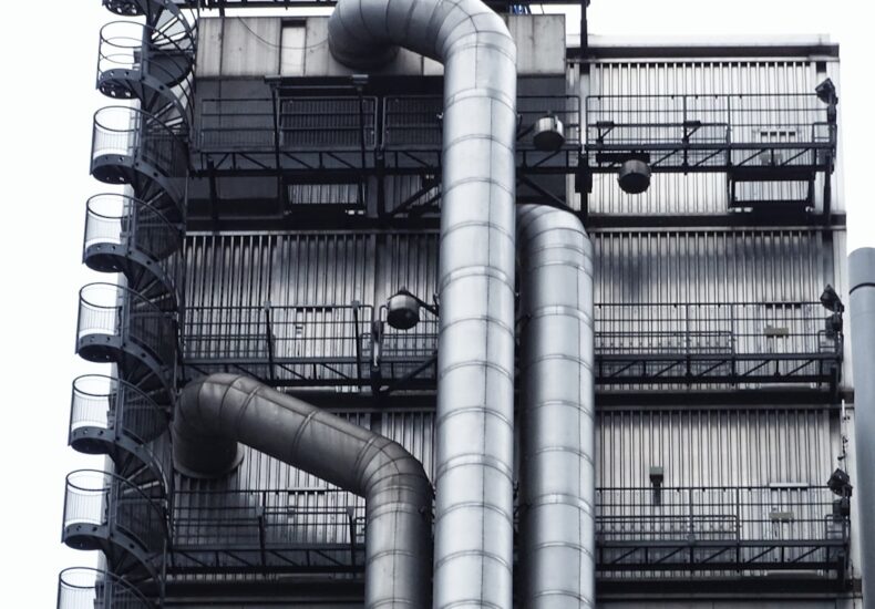 gray metal tube in a building