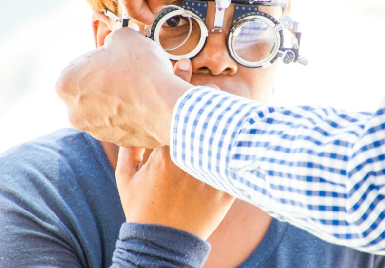 person wearing loupe glasses