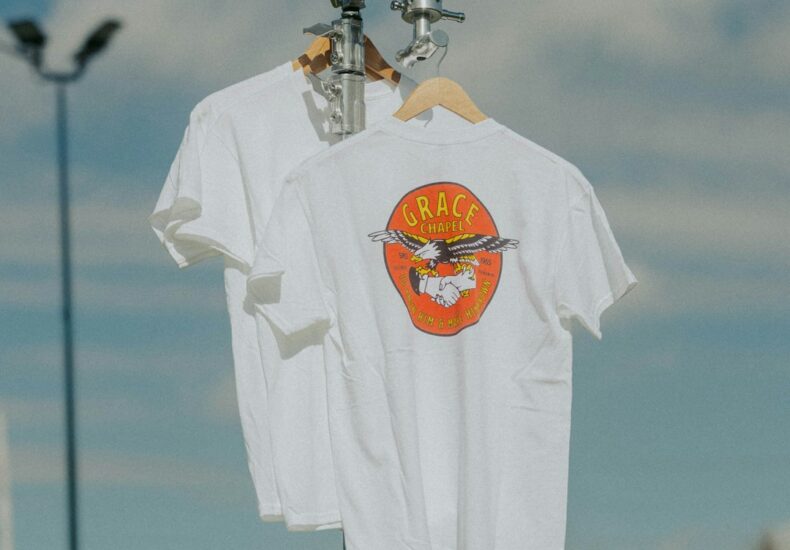 a white shirt hanging on a clothes line