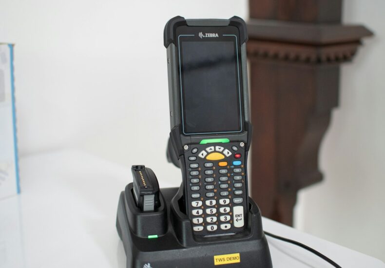 Barcode scanner device in charging dock on table