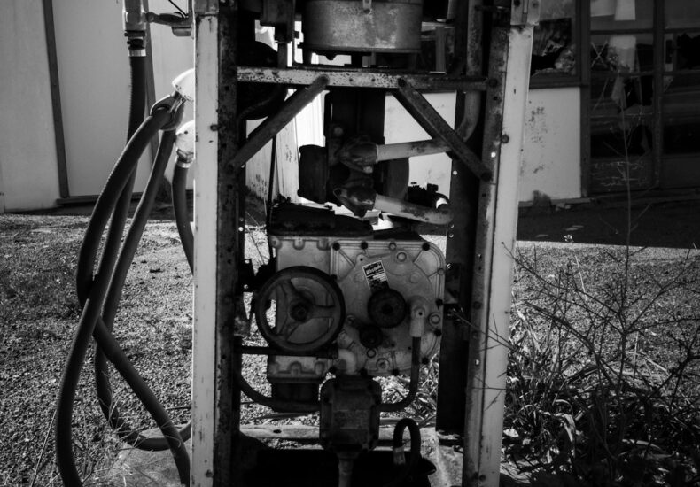 grayscale photo of metal machine