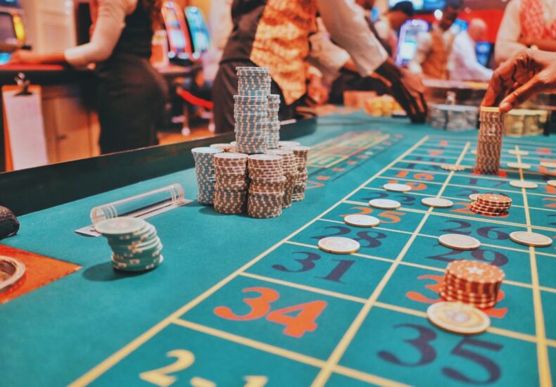 a casino table with a lot of chips on it