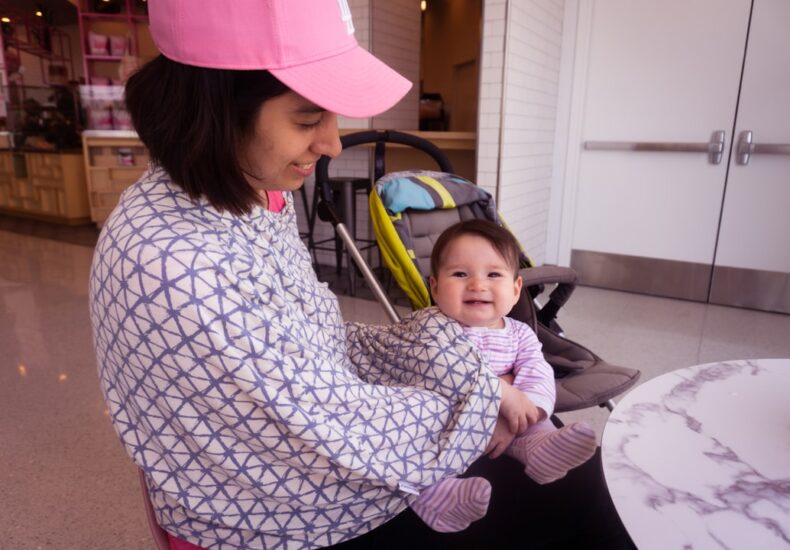 a person holding a baby