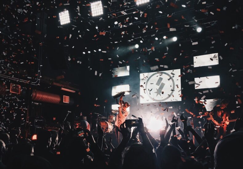 band playing instruments on stage