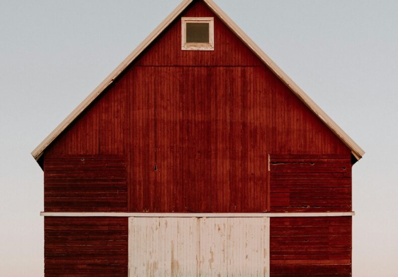 red and white wooden barn house