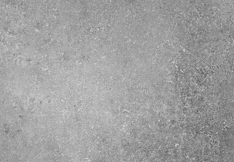 a black and white photo of a concrete wall