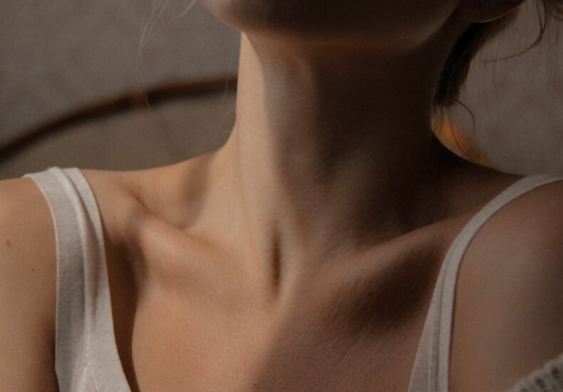 woman in white tank top