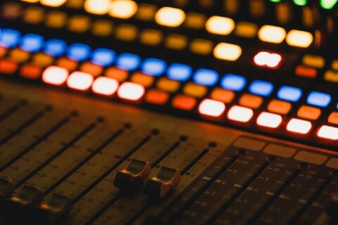 shallow focus photography of audio mixer