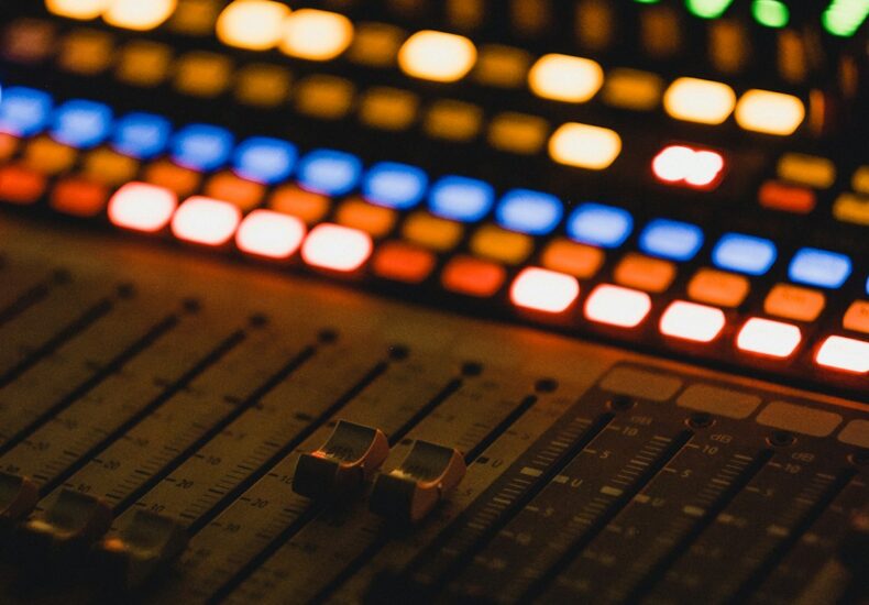 shallow focus photography of audio mixer