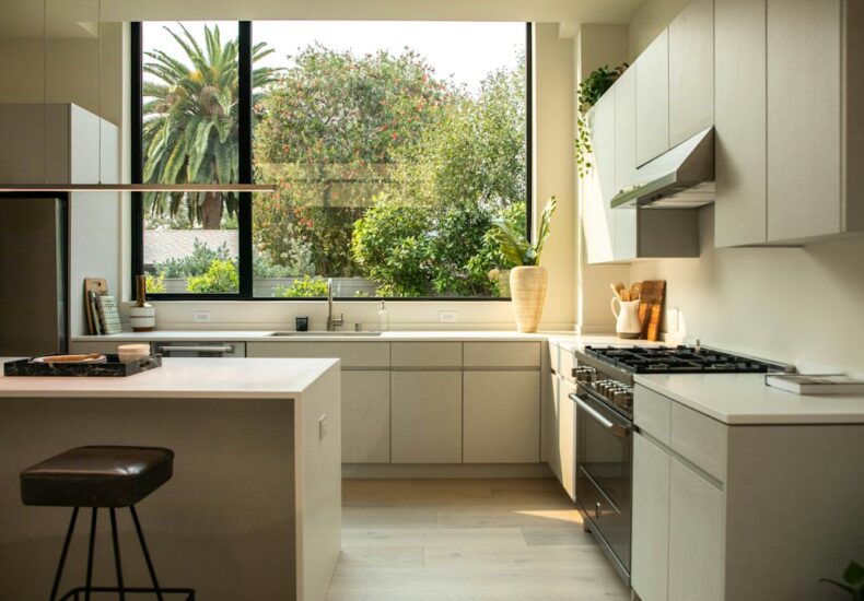 modern kitchen with island and large window