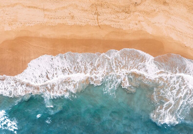 sea waves on brown sand