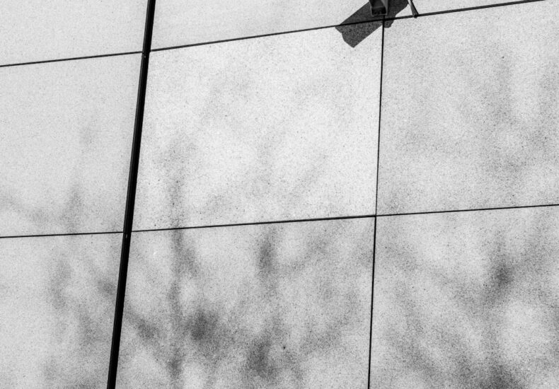 Security camera mounted on a modern building exterior